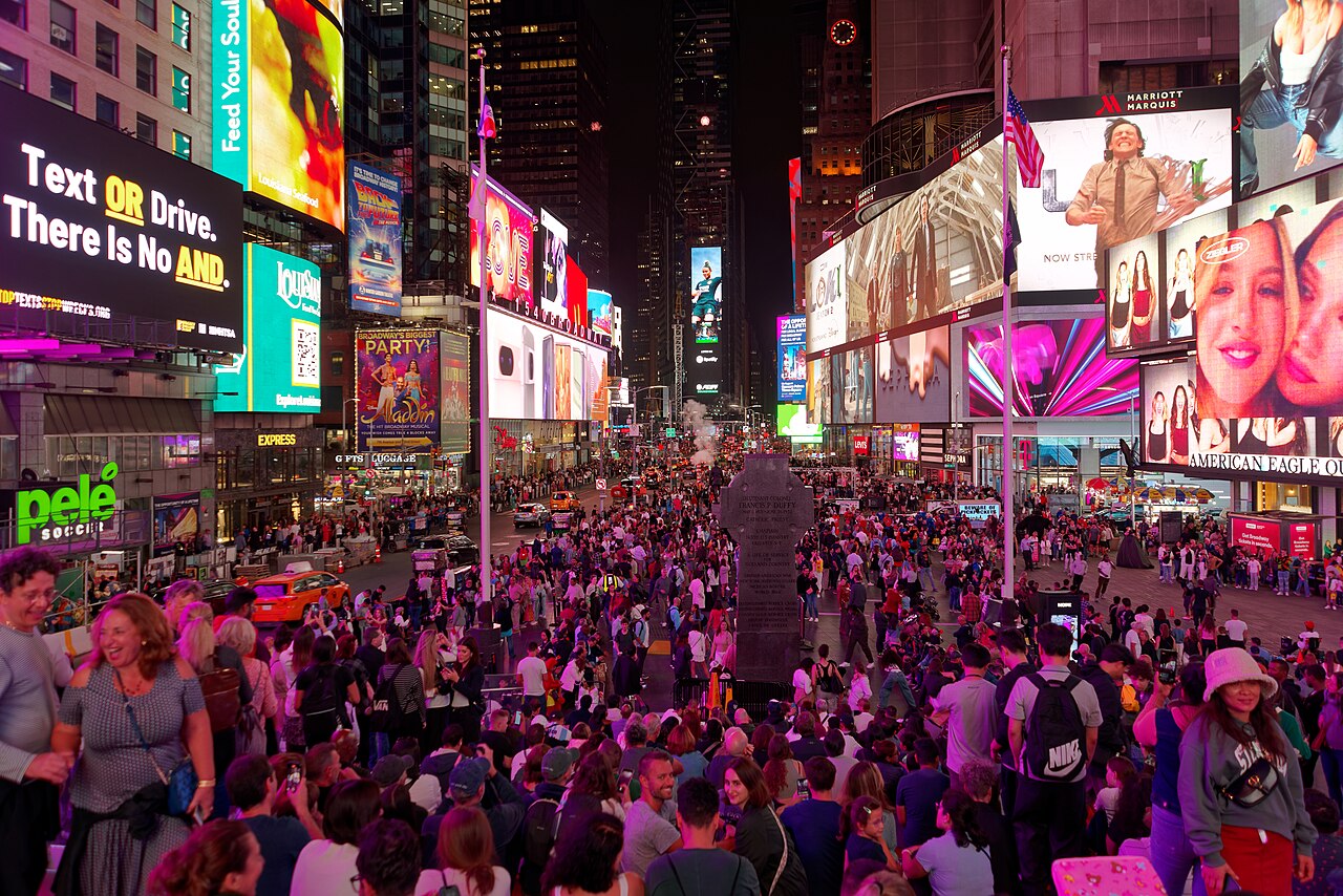 Times Square glowing at night