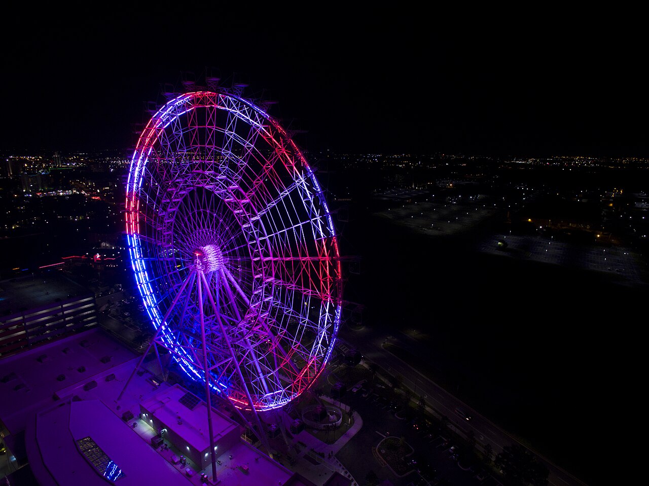 The Orlando Eye observation wheel at ICON Park at night